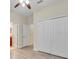 Bright bedroom featuring wood floors, lots of storage, and great natural light at 1569 Thetford Cir, Orlando, FL 32824