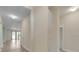 Bright hallway showcasing modern flooring and a seamless transition to the main living areas at 1569 Thetford Cir, Orlando, FL 32824