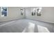 Spacious bedroom with neutral carpet and plenty of natural light from several windows at 3824 Deer Ridge Dr, Mount Dora, FL 32757