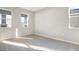 Bright bedroom with neutral walls, white trim, and carpet flooring at 3824 Deer Ridge Dr, Mount Dora, FL 32757