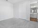 Bedroom with grey carpet and access to bathroom at 520 Summit River Dr, Apopka, FL 32712