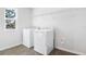 Laundry room with washer, dryer, and overhead shelving at 520 Summit River Dr, Apopka, FL 32712