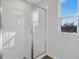 Clean shower with glass enclosure and bright white tile at 520 Summit River Dr, Apopka, FL 32712