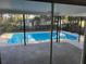 Inviting screened pool area with patio and steps at 1627 Providence Blvd, Deltona, FL 32725