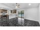 Modern kitchen features stainless steel appliances and granite countertops at 1855 Cavalier Ct, Kissimmee, FL 34744
