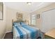 Cozy bedroom featuring a window and a closet for storage at 3151 Britannia Blvd # C, Kissimmee, FL 34747