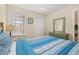 Relaxing bedroom with natural light and a closet at 3151 Britannia Blvd # C, Kissimmee, FL 34747