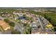 Community aerial shot showcasing proximity to nature, pools, and road access at 8716 Rain Forest Pl # D, Kissimmee, FL 34747