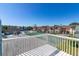 Balcony offering views of the pool, tennis court, and surrounding community at 8716 Rain Forest Pl # D, Kissimmee, FL 34747