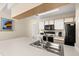 Bright kitchen area featuring ample countertop space and essential appliances at 8716 Rain Forest Pl # D, Kissimmee, FL 34747