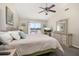 Spacious main bedroom with a view of the community swimming pool at 8716 Rain Forest Pl # D, Kissimmee, FL 34747