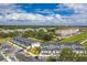 Aerial view of townhouses and community landscape at 2023 Claudia Ln, Kissimmee, FL 34741