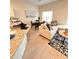 Open concept dining area with a glass table and four chairs at 2023 Claudia Ln, Kissimmee, FL 34741