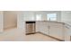 Kitchen features granite countertops, white cabinets, and stainless steel appliances at 2023 Claudia Ln, Kissimmee, FL 34741