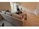 Spacious living area with sectional sofa, and sliding glass doors at 2023 Claudia Ln, Kissimmee, FL 34741