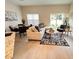 Bright and airy living room with a sectional sofa and patio access at 2023 Claudia Ln, Kissimmee, FL 34741