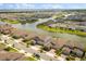 Beautiful aerial view of a neighborhood featuring houses and lakes at 2949 Nottel Dr, St Cloud, FL 34772