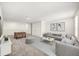 Finished basement with a comfortable seating area and a foosball table for entertainment at 2949 Nottel Dr, St Cloud, FL 34772