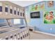 bedroom with bunk bed and Disney theme at 8932 Cabot Cliffs Dr, Davenport, FL 33896
