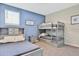 Guest bedroom with full-size bed and twin-over-twin bunk bed at 8932 Cabot Cliffs Dr, Davenport, FL 33896