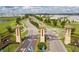 Gated community entrance with signage at 8932 Cabot Cliffs Dr, Davenport, FL 33896