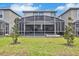 Home exterior showcasing private pool and backyard at 8932 Cabot Cliffs Dr, Davenport, FL 33896