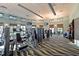 State-of-the-art fitness center with various exercise equipment at 8932 Cabot Cliffs Dr, Davenport, FL 33896
