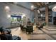Community clubhouse lobby with seating at 8932 Cabot Cliffs Dr, Davenport, FL 33896