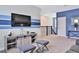 Recreation room with large TV and storage cabinet at 8932 Cabot Cliffs Dr, Davenport, FL 33896