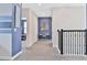 Upstairs hallway with built-in desk and access to bedrooms at 8932 Cabot Cliffs Dr, Davenport, FL 33896
