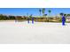 Community sand volleyball court, offering residents a space for outdoor recreation and friendly competition under sunny skies at 8932 Cabot Cliffs Dr, Davenport, FL 33896