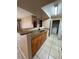 Kitchen features granite countertops and wood cabinets at 3028 Parkway Blvd # 210, Kissimmee, FL 34747