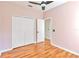 Bedroom with tile floors and double door closet at 3634 Northwoods Dr, Kissimmee, FL 34746