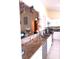Kitchen featuring granite counters, stainless steel appliances and white cabinets at 101 Whitehall Way, Kissimmee, FL 34758