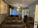 Comfortable living room with leather recliners, ceiling fan, and neutral paint for a relaxing atmosphere at 2606 Royal Fern Pl, Kissimmee, FL 34758