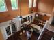 Open living room featuring soaring ceilings, kitchen with island, and french doors that provide ample natural light at 2606 Royal Fern Pl, Kissimmee, FL 34758