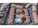 Aerial view of community showing building layout and amenities at 8846 Coral Palms Ct # A, Kissimmee, FL 34747
