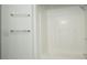 Bathroom with shower and tub, and updated towel bars at 8846 Coral Palms Ct # A, Kissimmee, FL 34747