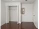 White built-in closet with double doors and shelving at 8846 Coral Palms Ct # A, Kissimmee, FL 34747
