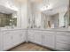 Elegant bathroom with double vanity and spacious shower at 9182 Sonoma Coast Dr, Winter Garden, FL 34787