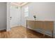 Bright entryway with hardwood floors and a console table at 9182 Sonoma Coast Dr, Winter Garden, FL 34787