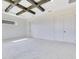 A bright, airy bedroom with a coffered ceiling, neutral walls, and lots of natural light at 13809 Abberwick Dr, Orlando, FL 32832
