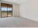 Bright bedroom with large sliding glass doors to the outdoor patio at 13809 Abberwick Dr, Orlando, FL 32832