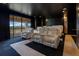 Impressive home theater featuring tiered seating and an expansive view outdoors at 13809 Abberwick Dr, Orlando, FL 32832