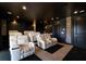 Luxurious home theater with plush seating, creating an immersive viewing experience at 13809 Abberwick Dr, Orlando, FL 32832