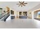 A bright and open living area with tile floors and a view of the outdoor living space at 13809 Abberwick Dr, Orlando, FL 32832