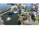 Aerial view showing community pool, tennis courts, and lush landscaping at 13838 Fairway Island Dr # 1432, Orlando, FL 32837
