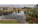 Community features a serene lake and lush landscaping at 13838 Fairway Island Dr # 1432, Orlando, FL 32837