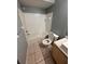 Clean bathroom with a bathtub, toilet and single sink at 13838 Fairway Island Dr # 1432, Orlando, FL 32837
