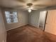 Bedroom with ceiling fan and window at 13838 Fairway Island Dr # 1432, Orlando, FL 32837